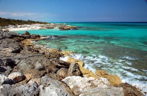 waves breaking against a rocky shore