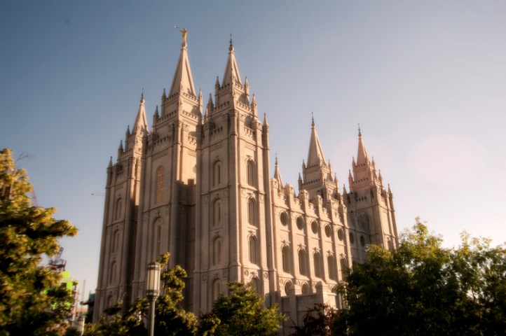 Worm's eye view of Mormon temple and some trees.